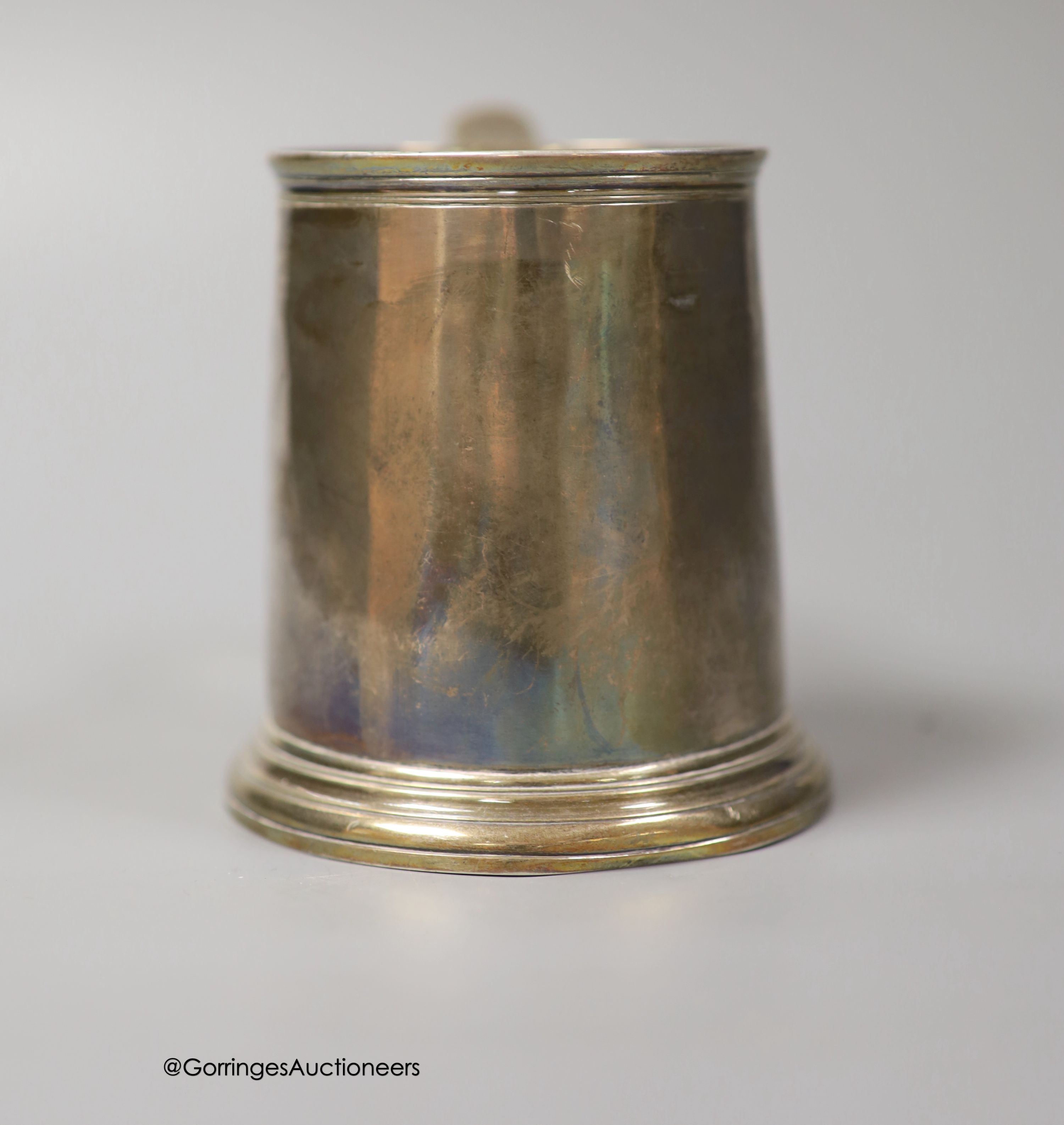 An early George II silver small mug, by James Smith I, London, 1727, height 92mm, 156 grams (a.f.)